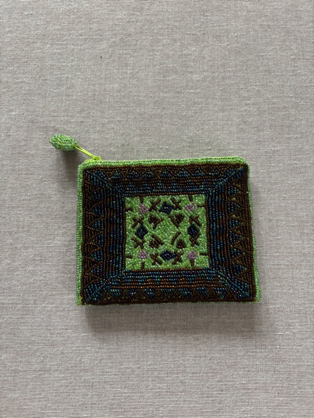Green beaded coin purse.